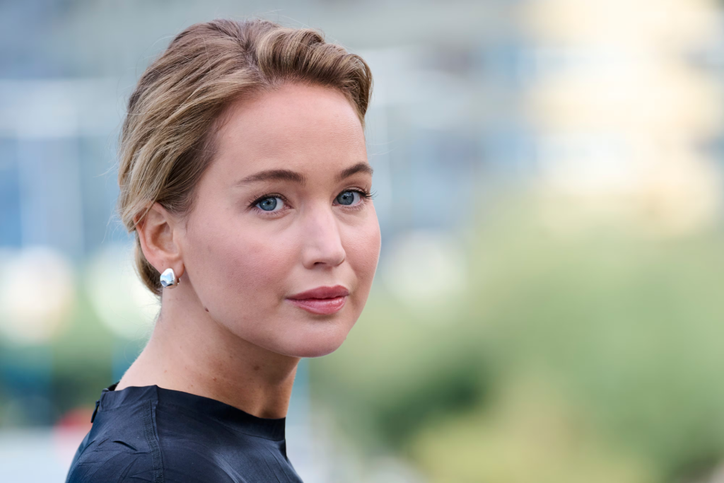 Featured image for Jennifer Lawrence Has a Novel Swap for a Travel Bag: a $3,450 Dior Book Tote